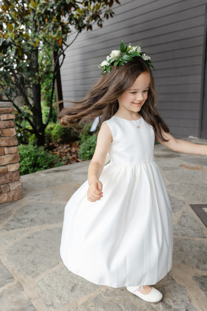 Flower girl during Taylor and Alex’s Park Crest wedding