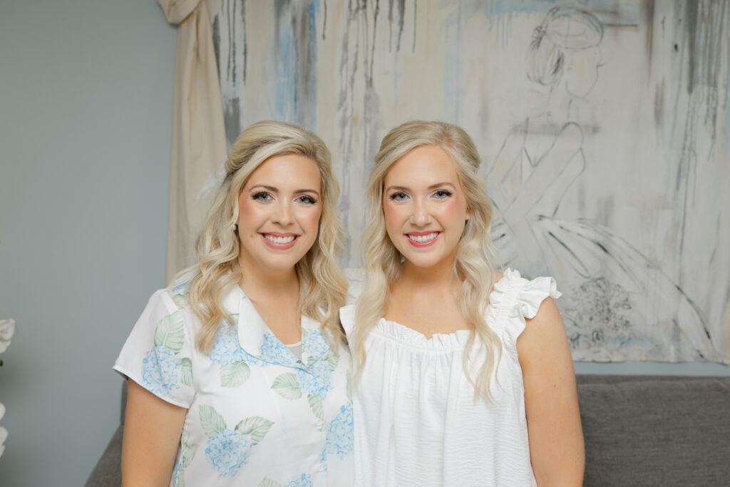 Taylor getting ready with one of her bridesmaids before her wedding