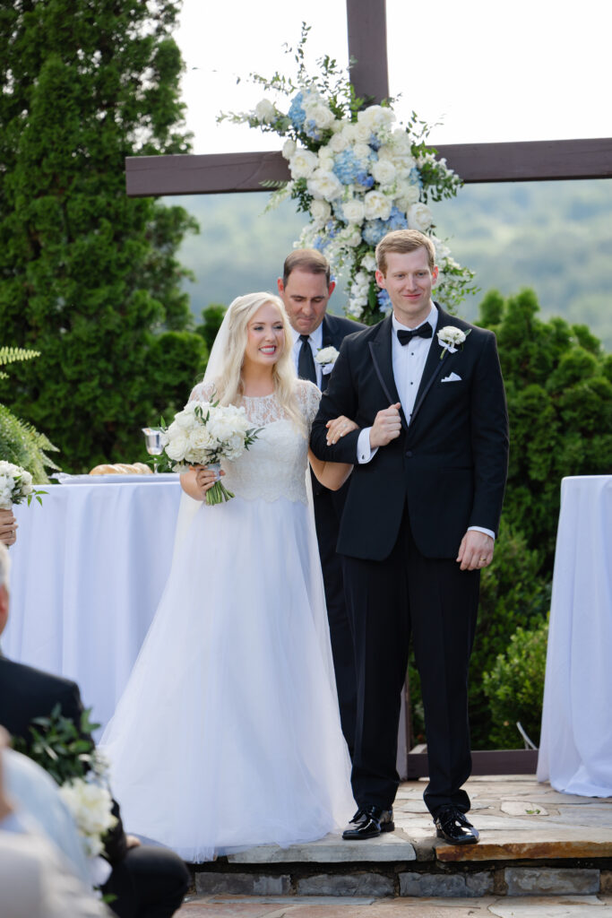 Full-length wedding portrait of Taylor and Alex at Park Crest