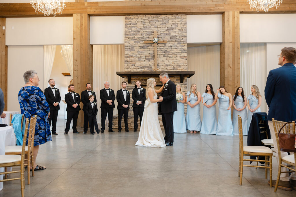 Sweet candid moment during Taylor and Alex’s wedding reception