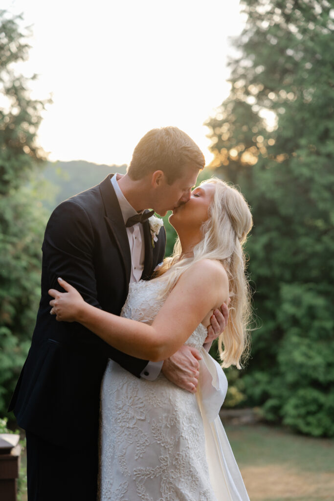 Close sunset portrait of Taylor and Alex after their rainy wedding day