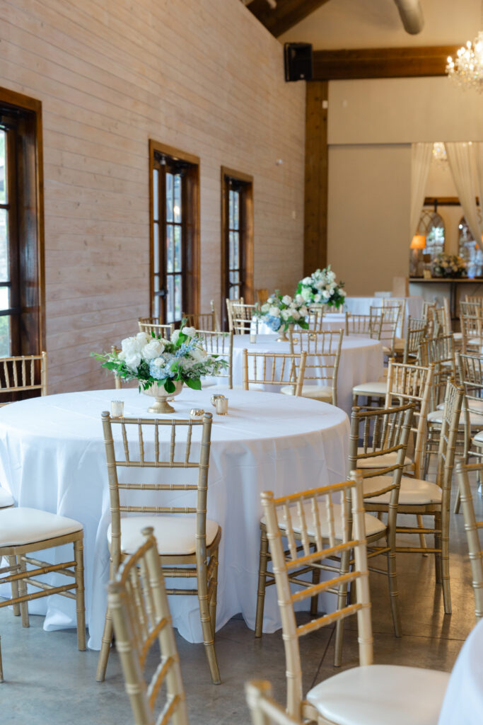 Reception tables decorated for a blue and white Park Crest wedding