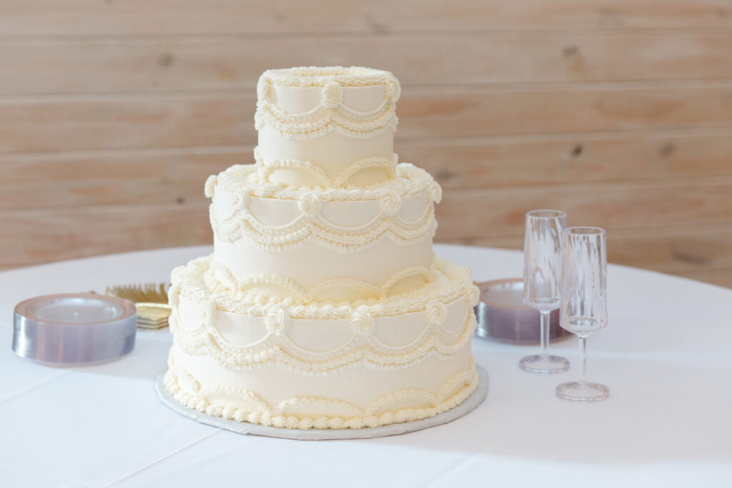 Wedding cake displayed at Taylor and Alex’s Park Crest reception