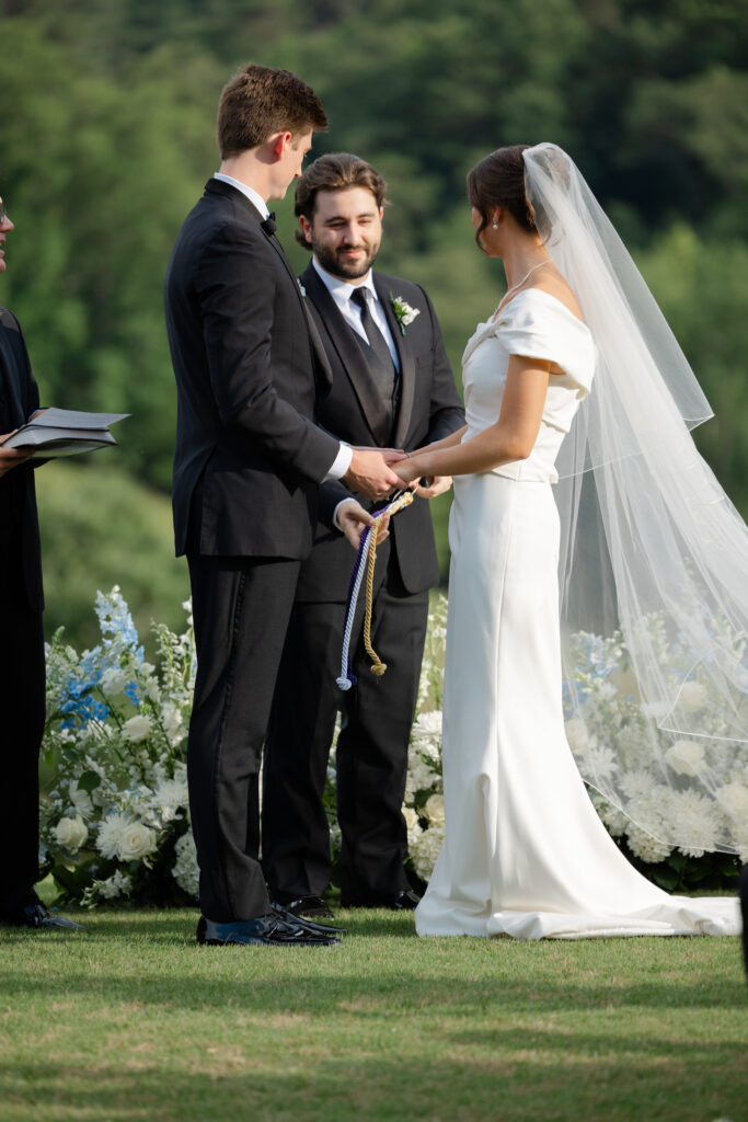 Brooke and Zach standing together during their wedding ceremony