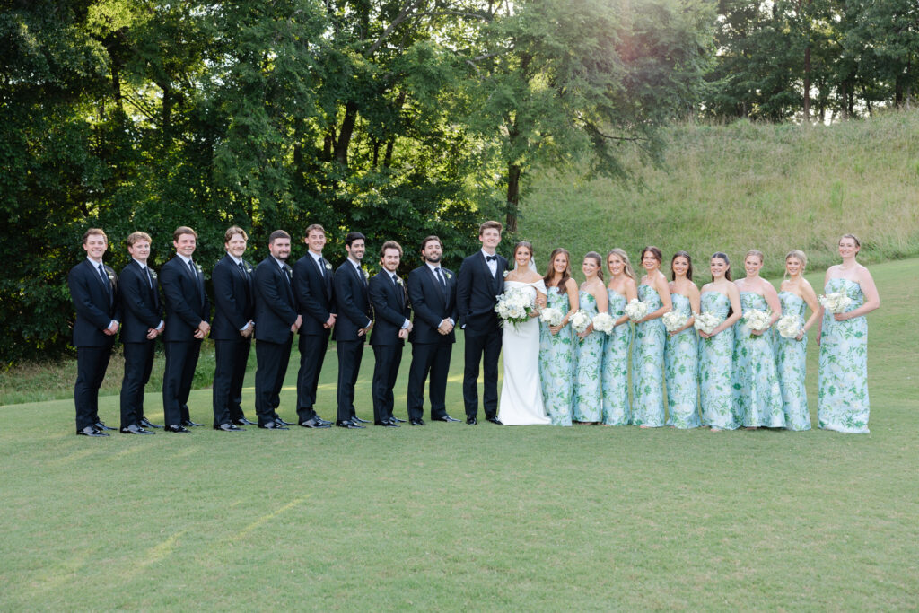 Brooke and Zach with their wedding party at Old Overton Country Club