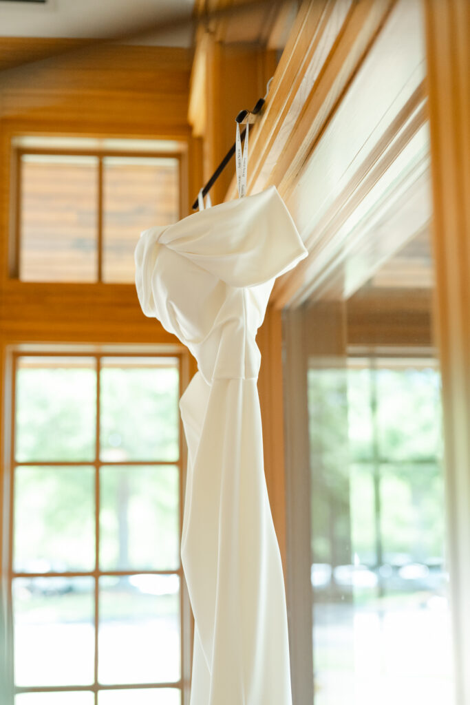 Brooke's classic off-the-shoulder wedding gown