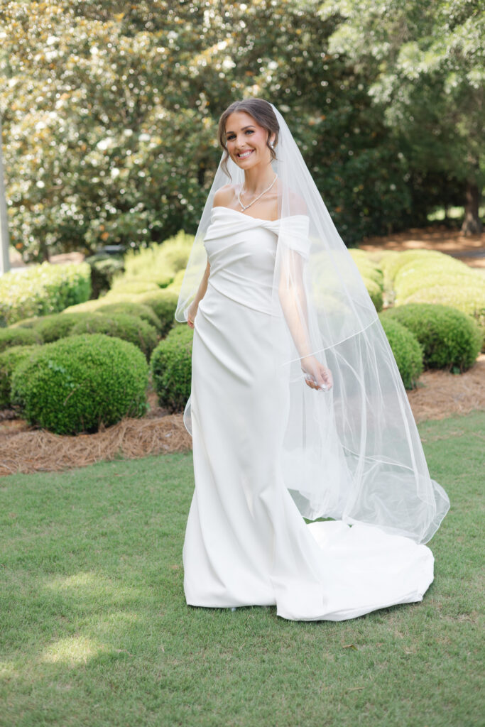 Brooke in her off-the-shoulder wedding gown at Old Overton Country Club
