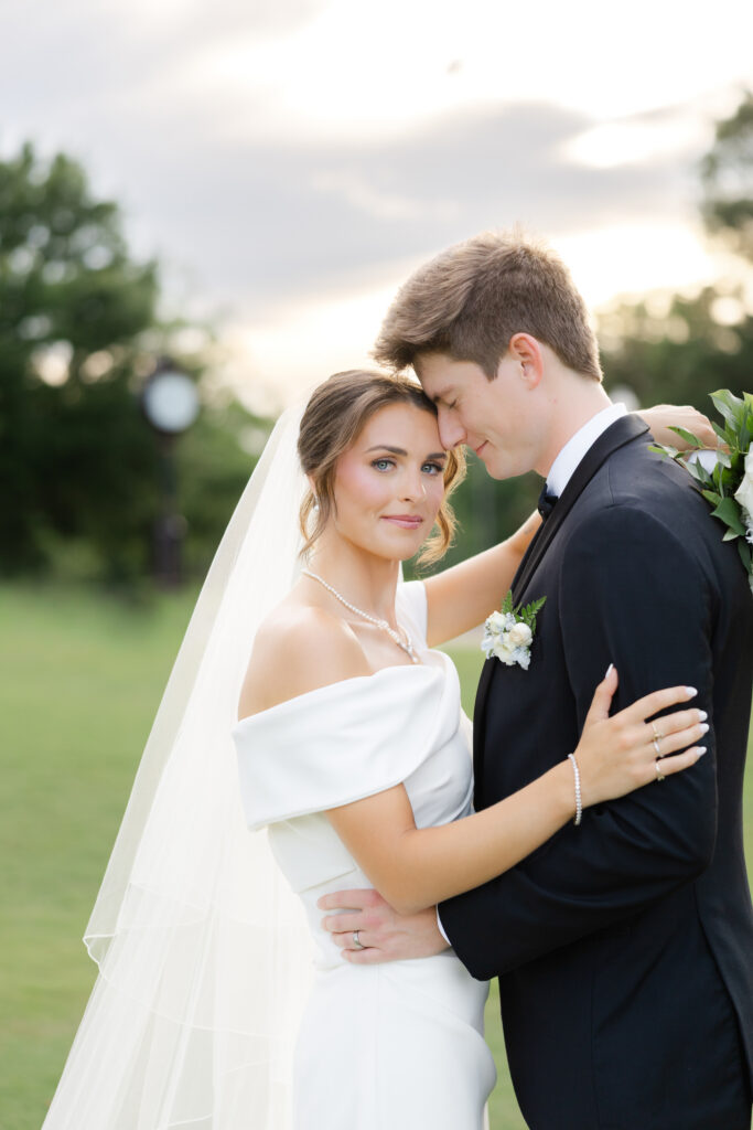 Brooke and Zach during sunset wedding portraits at Old Overton Country Club